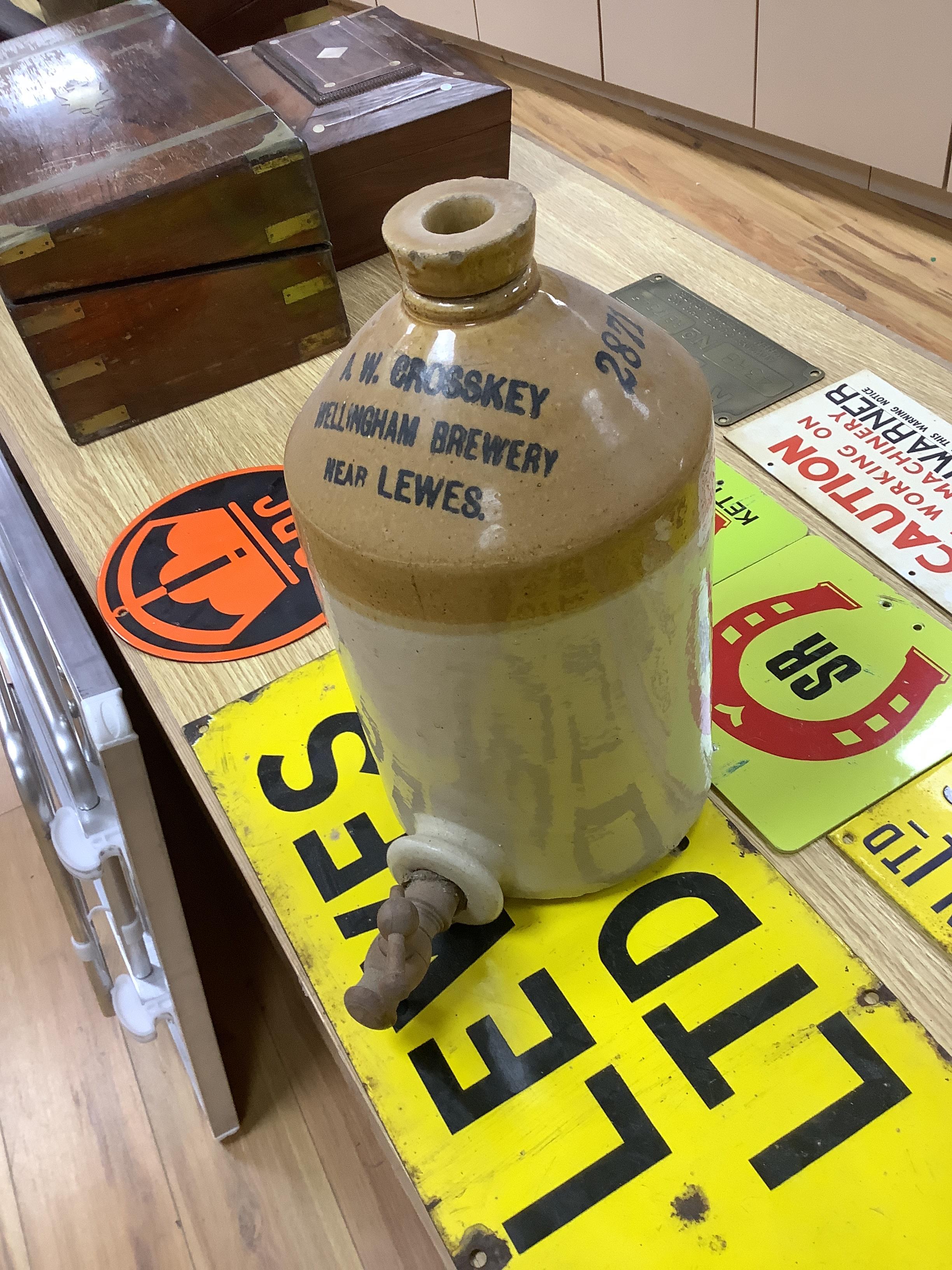 9 various stoneware vessels including local brewers such as Lewes, Worthing, Hastings and Brighton
